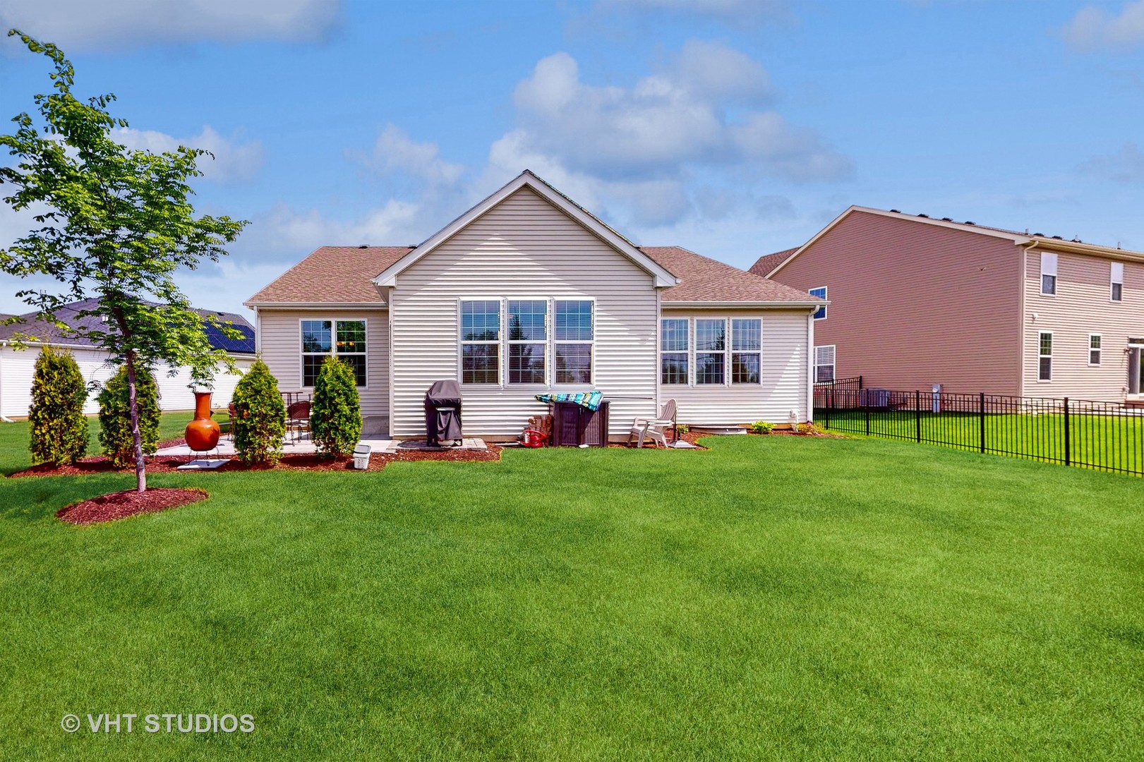 5841 Fairview Lane Hoffman Estates, IL 60192 - Photo 33 of 35 a front view of a house with a yard and green space