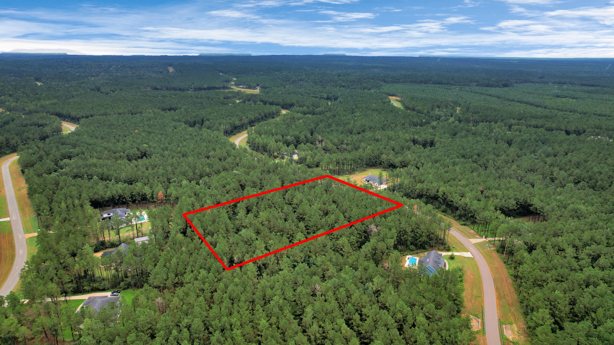 10940 Ruger Road Willis, TX 77378 - Photo 11 of 30 a view of a lush green field