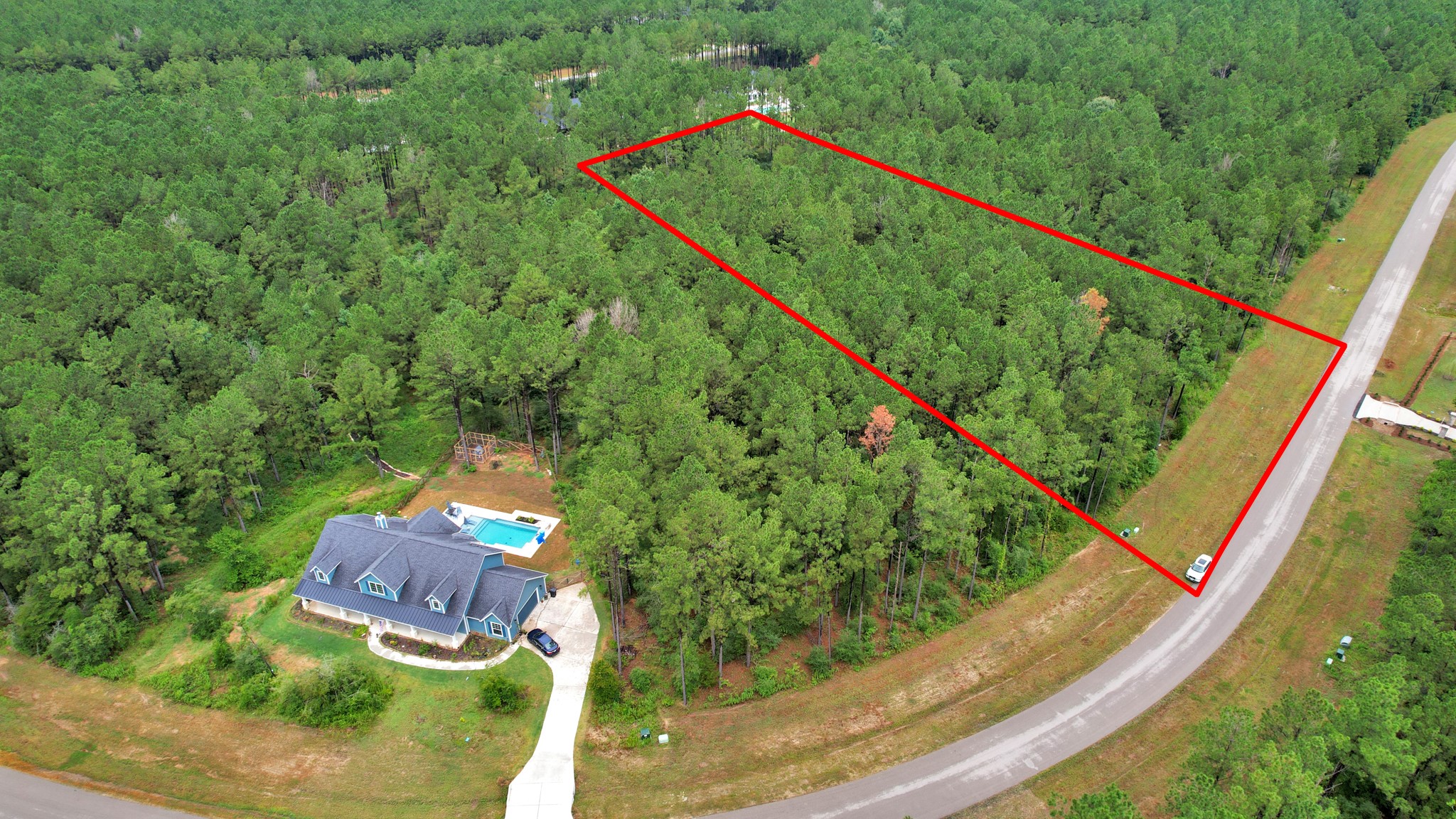 10940 Ruger Road Willis, TX 77378 - Photo 27 of 30 a view of a balcony with a forest