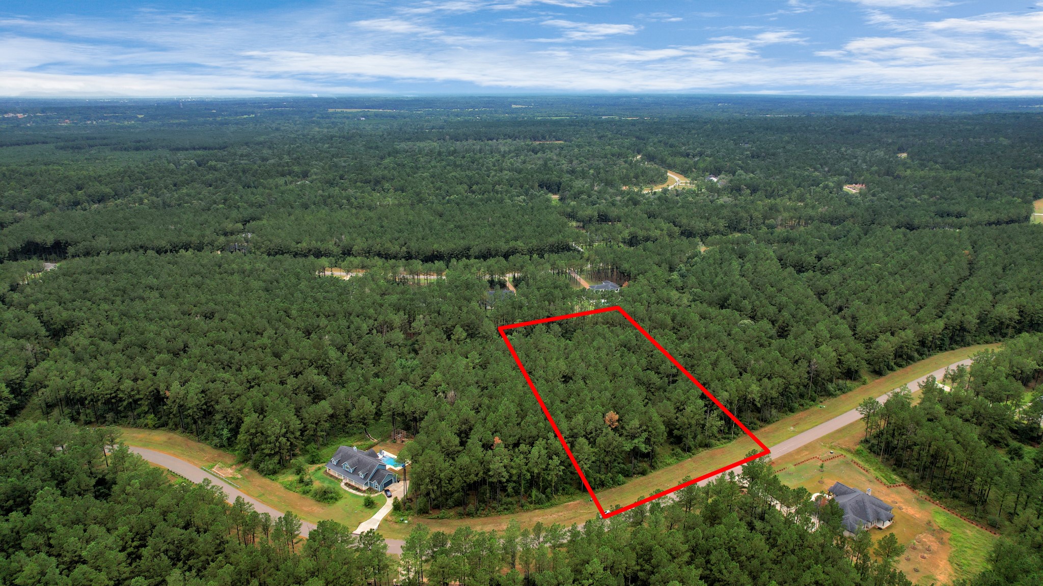 10940 Ruger Road Willis, TX 77378 - Photo 4 of 30 an aerial view of a houses with a yard