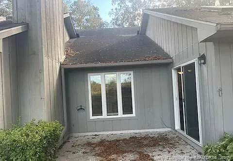 a view of a yard with an outdoor space