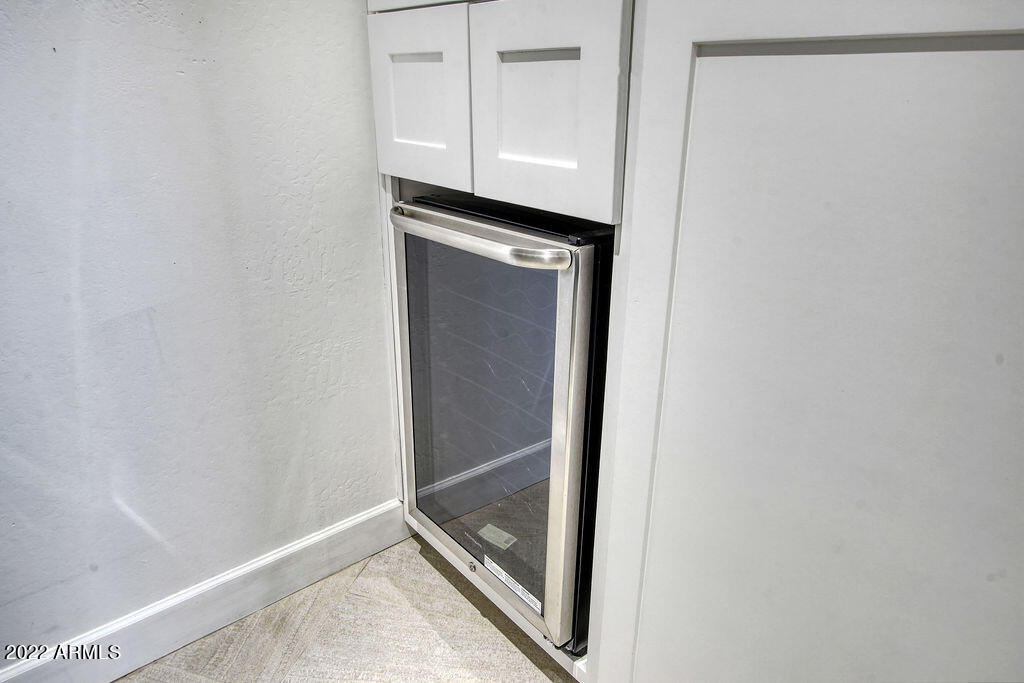 10801 East Happy Valley Road, Unit 113 Scottsdale, AZ 85255 - Photo 55 of 96 Laundry room wine refrigerator