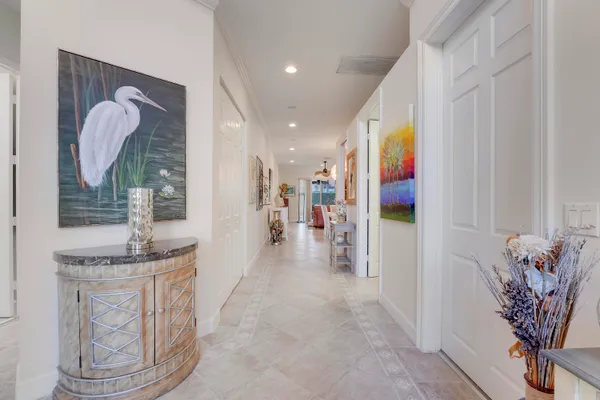 a lobby with furniture and window