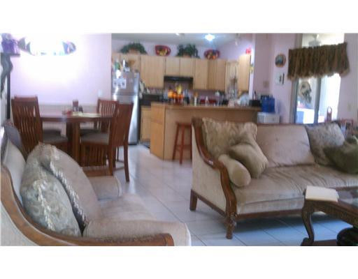 22273 Timberly Drive, Unit 57E Boca Raton, FL 33428 - Photo 4 of 10 Living Room