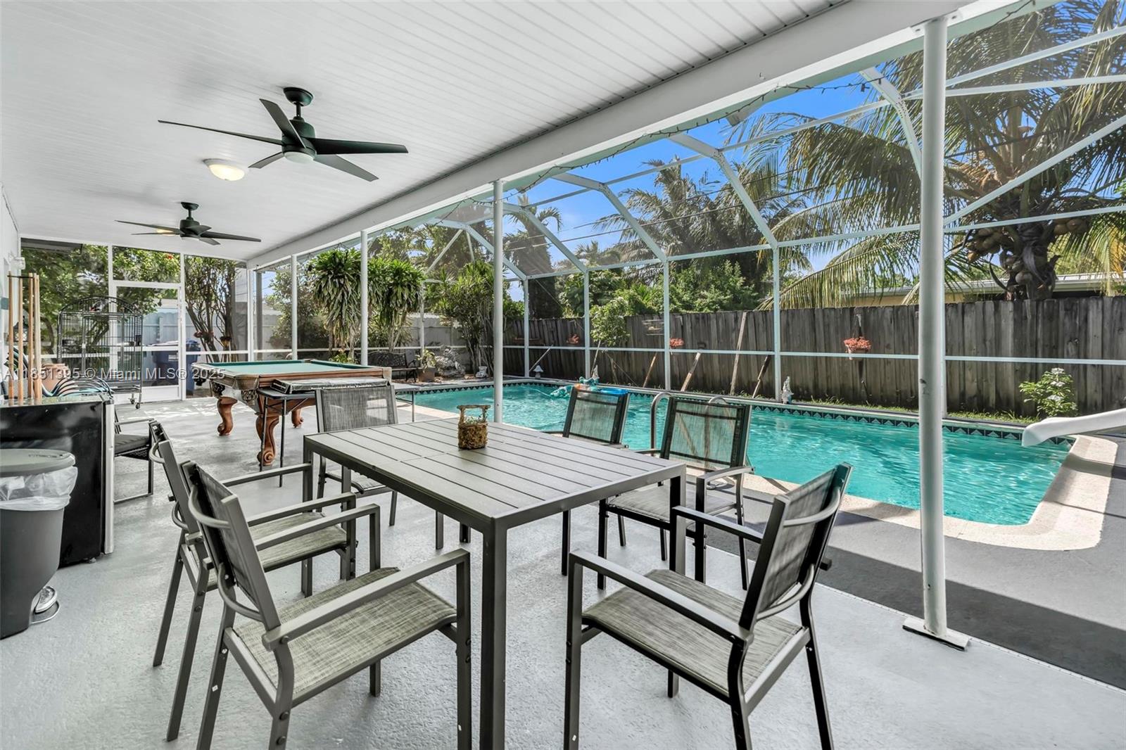 8711 Southwest 191st Street Cutler Bay, FL 33157 - Photo 11 of 56 a view of a patio with a yard
