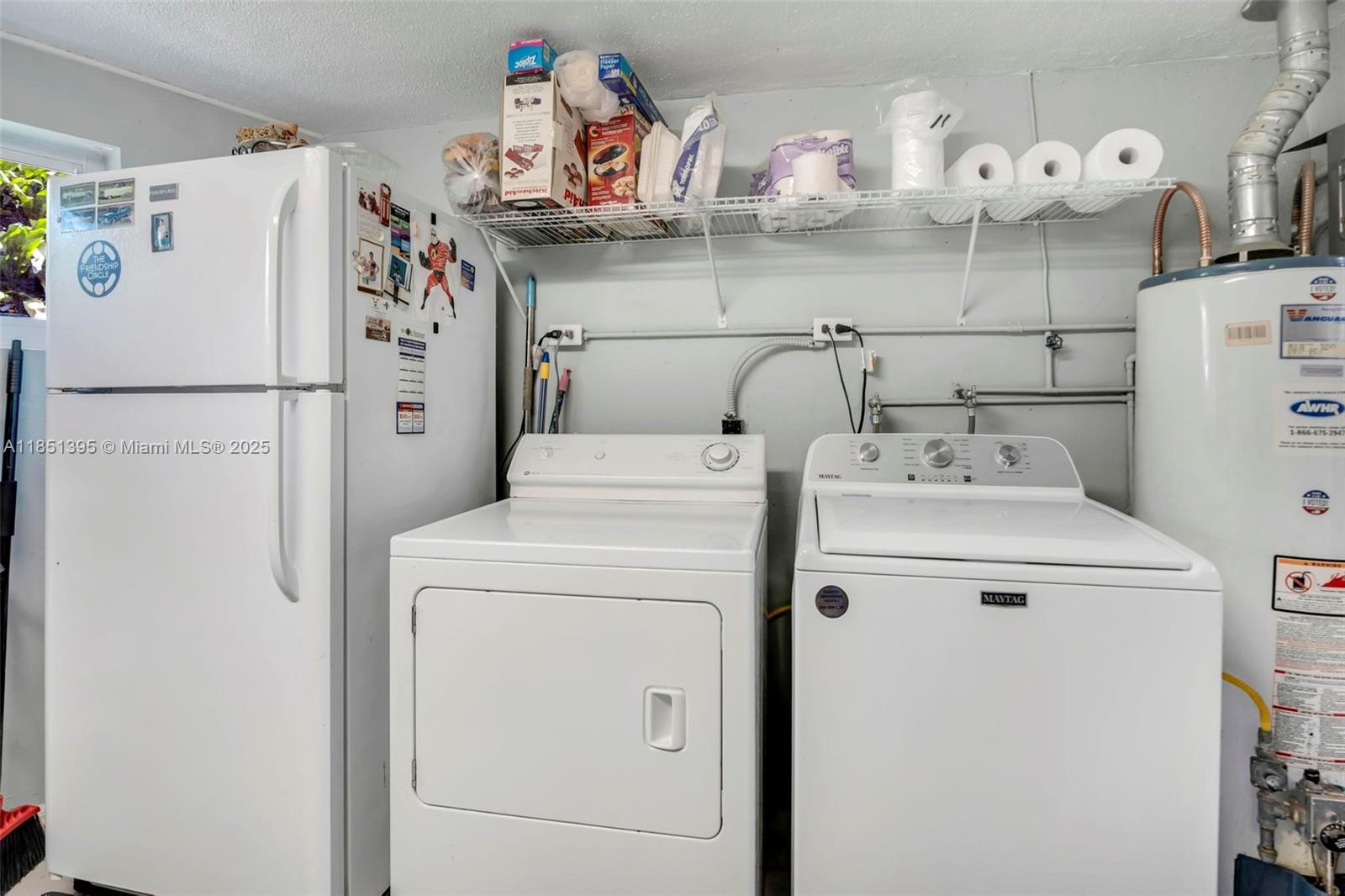 8711 Southwest 191st Street Cutler Bay, FL 33157 - Photo 32 of 56 a utility room with dryer and washer