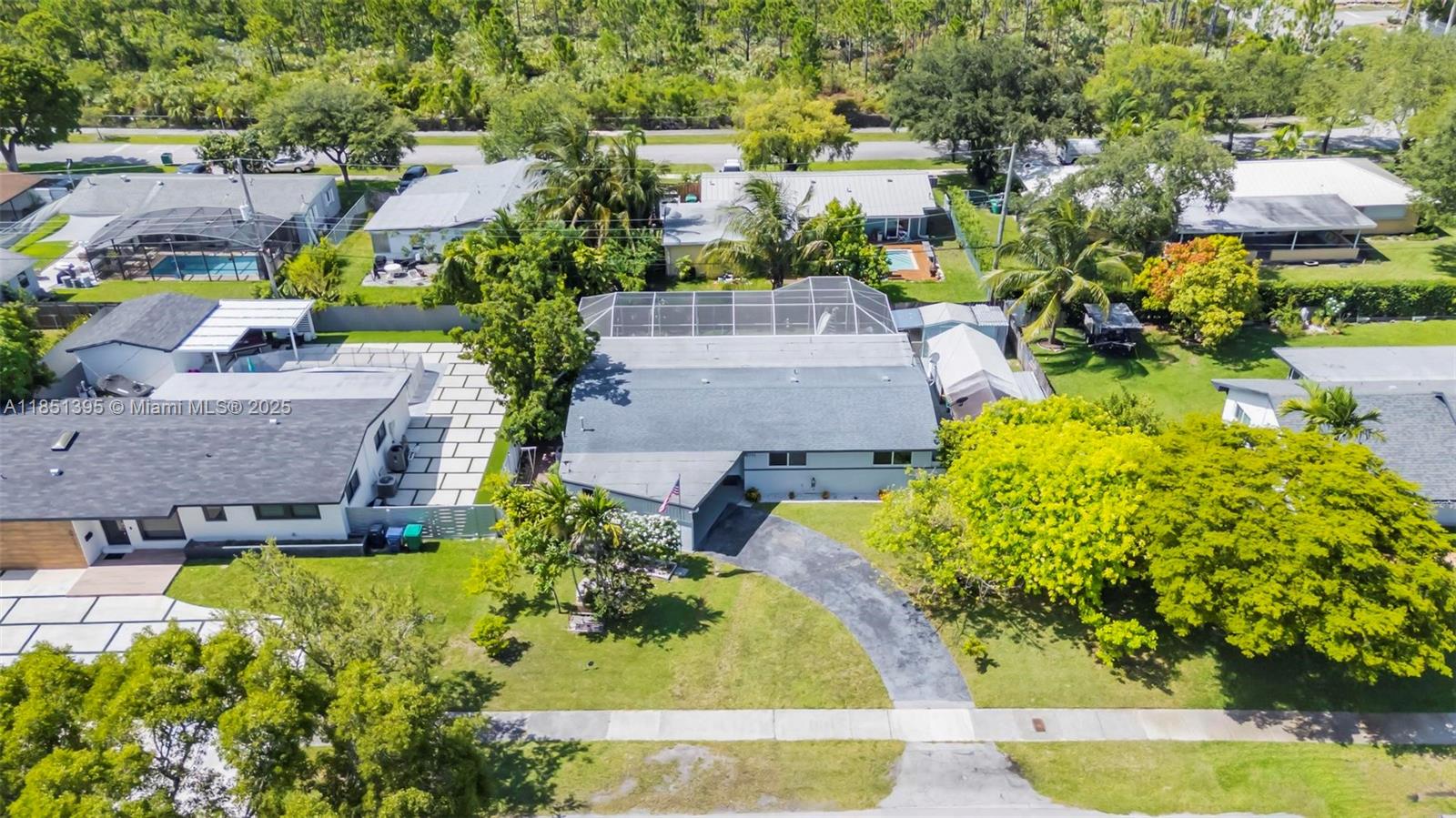 8711 Southwest 191st Street Cutler Bay, FL 33157 - Photo 38 of 56 an aerial view of a house with a yard basket ball court and outdoor seating