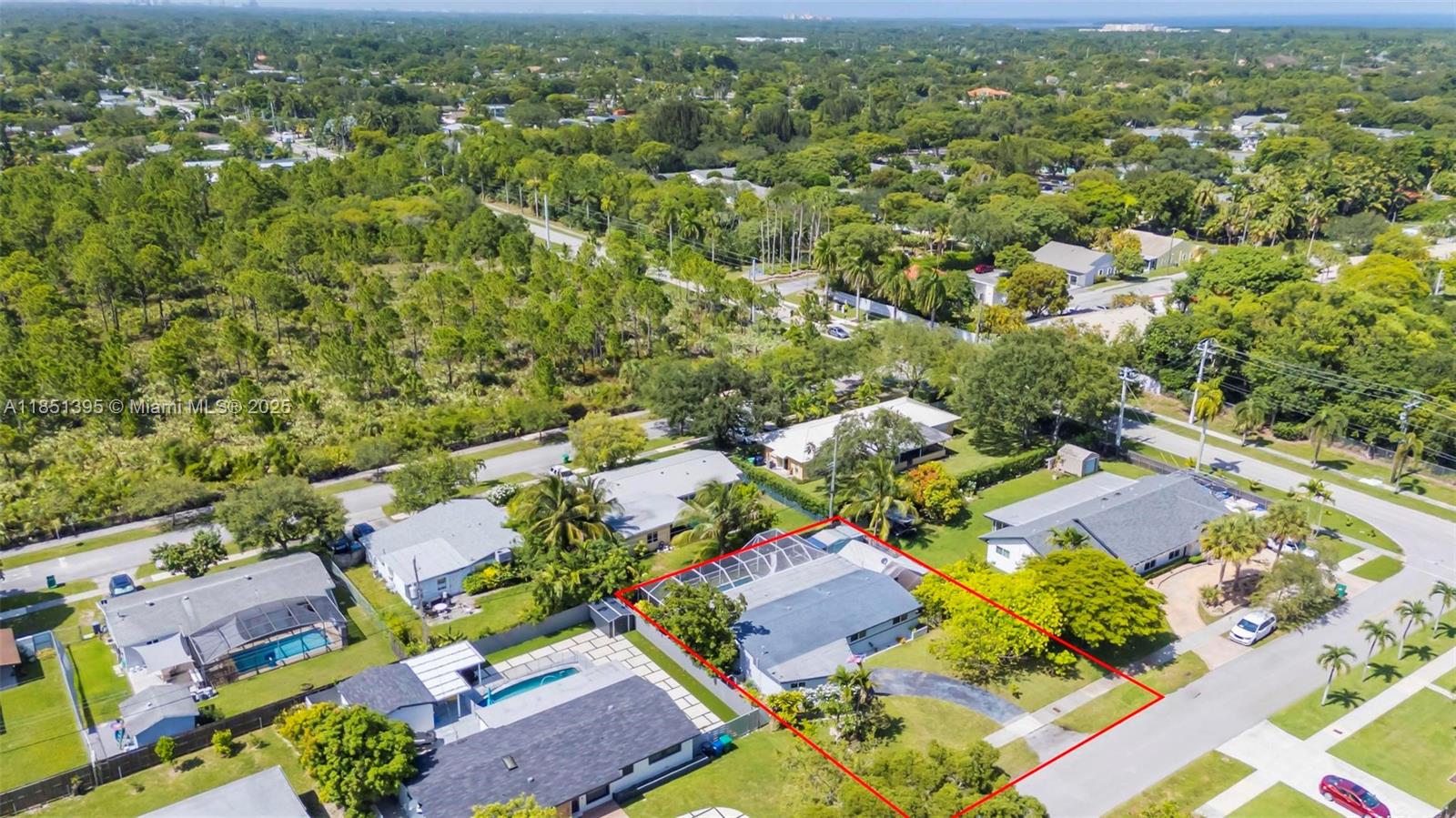 8711 Southwest 191st Street Cutler Bay, FL 33157 - Photo 42 of 56 an aerial view of residential houses with outdoor space