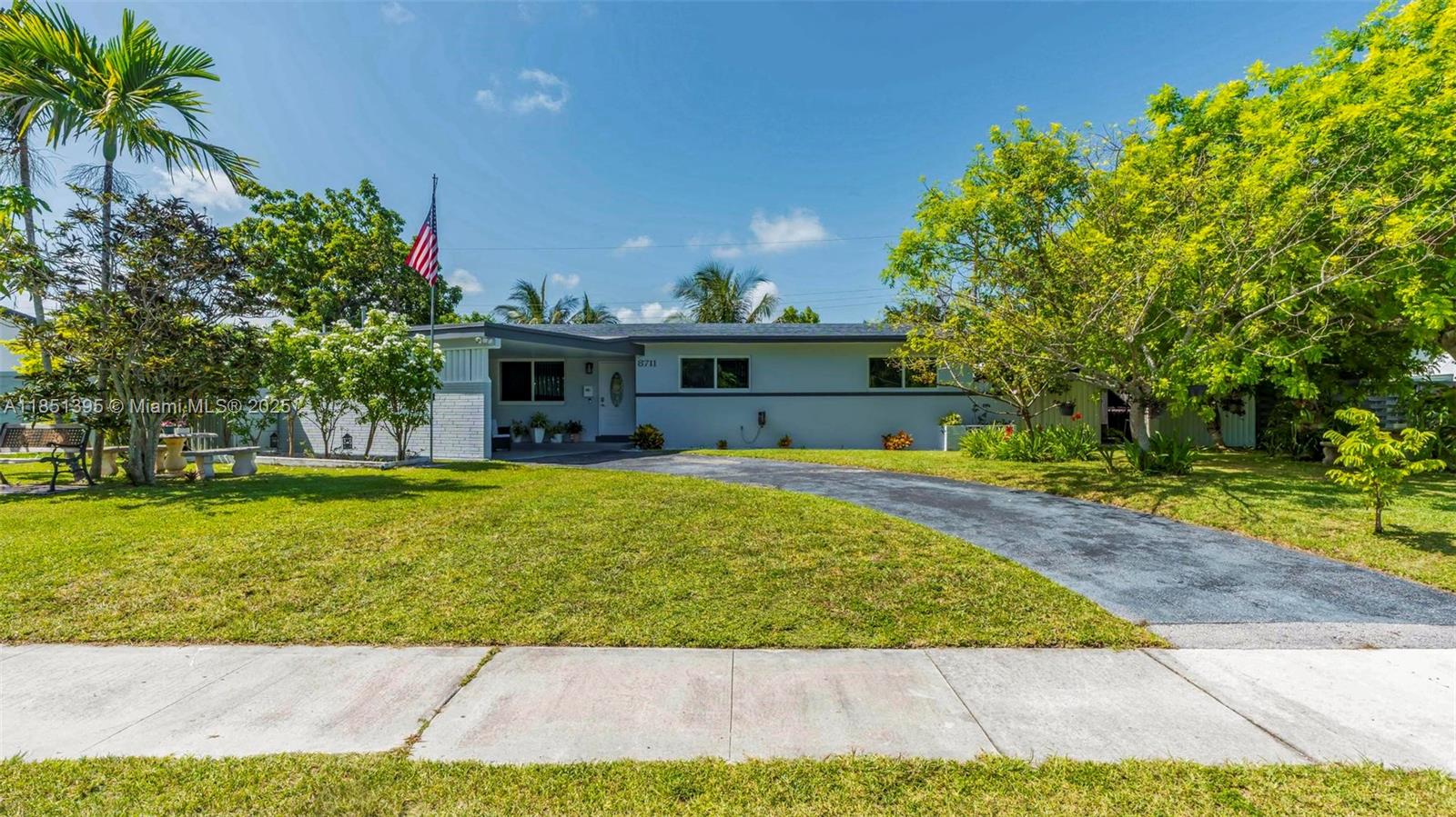 8711 Southwest 191st Street Cutler Bay, FL 33157 - Photo 50 of 56 a view of house with swimming pool