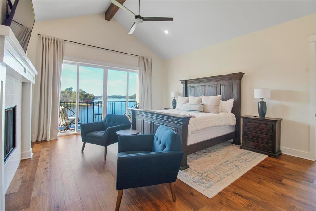 22240 Mallards Cove Bullard, TX 75757 - Photo 16 of 40 a bedroom with a large bed and a couch