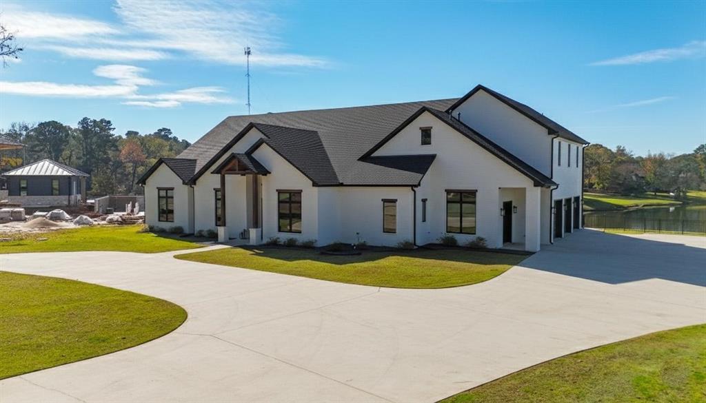 22240 Mallards Cove Bullard, TX 75757 - Photo 2 of 40 a view of a house with swimming pool and yard