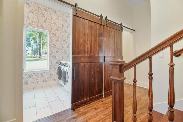 a view of a kitchen with washer and dryer