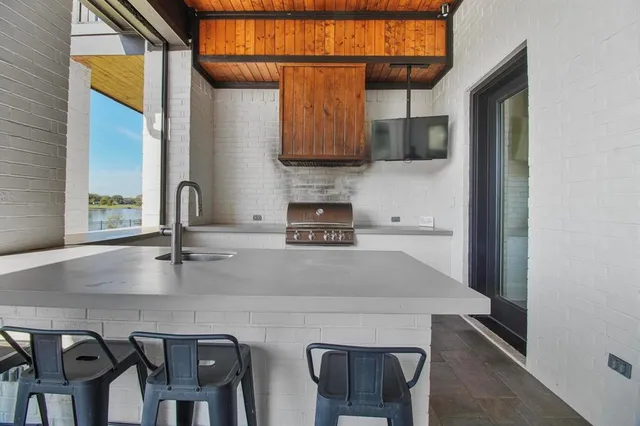 a living room with furniture and a bathtub