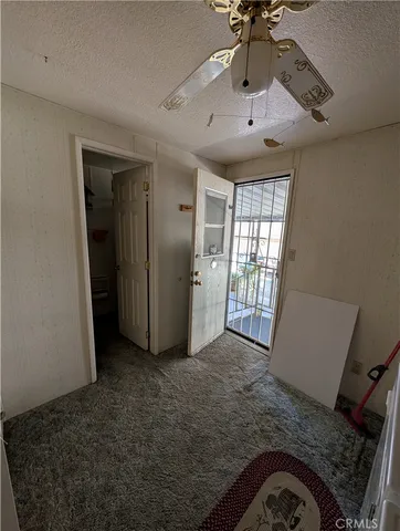 a view of livingroom with furniture and chandelier