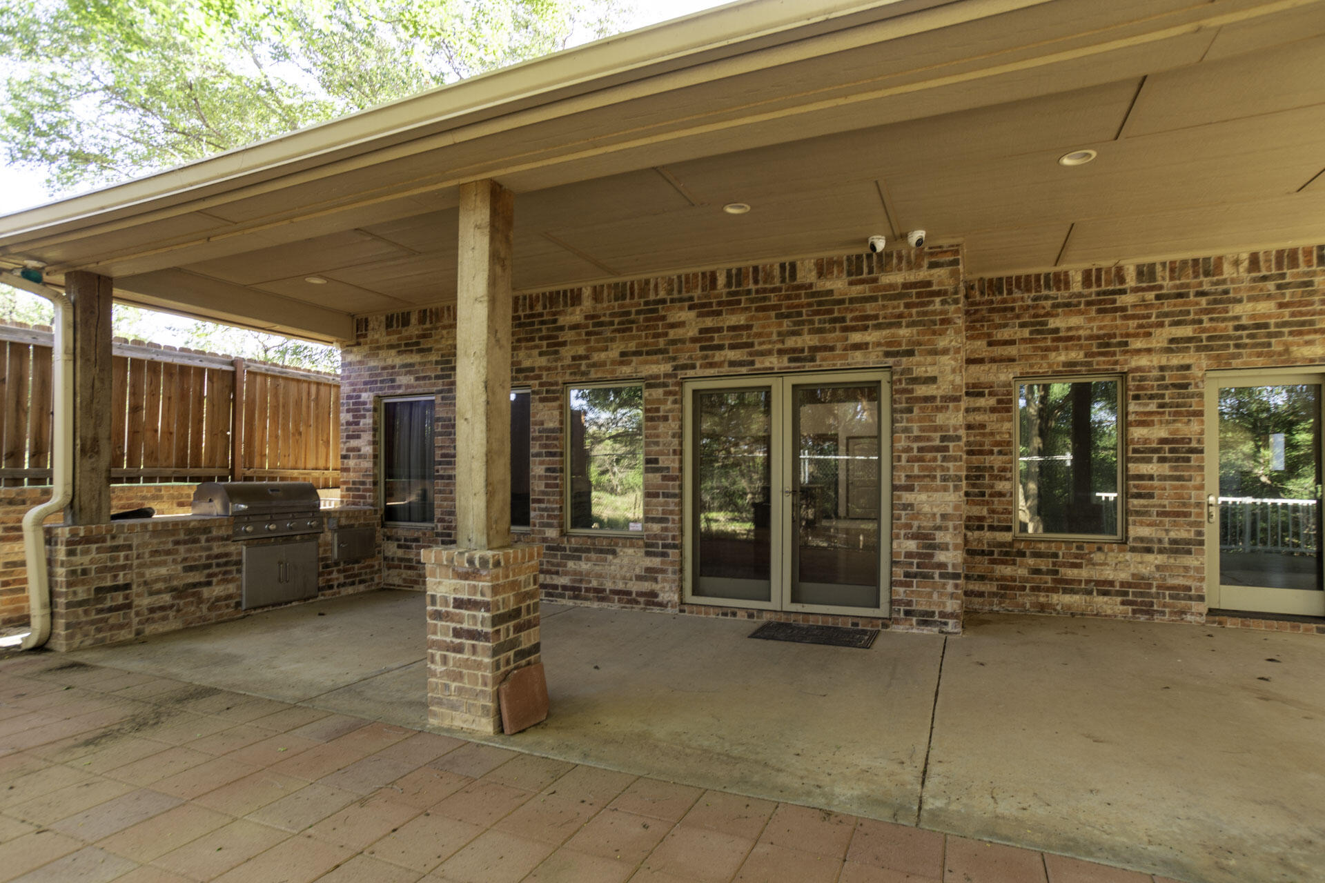 33 West Lakeshore Drive Ransom Canyon, TX 79366 - Photo 43 of 48 a view of a patio with table and chairs