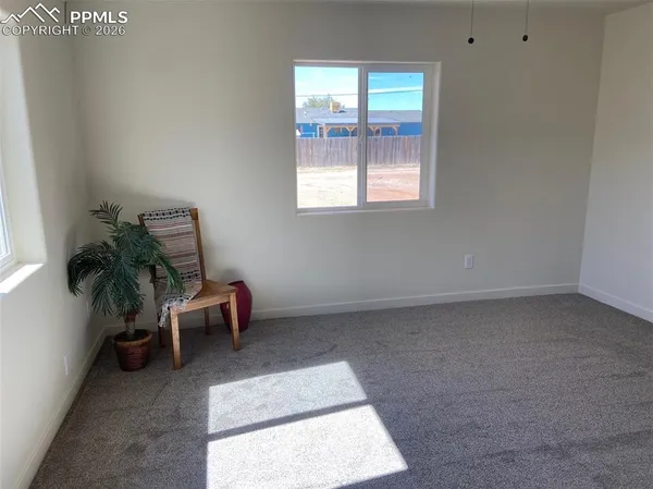 an entryway with a bench