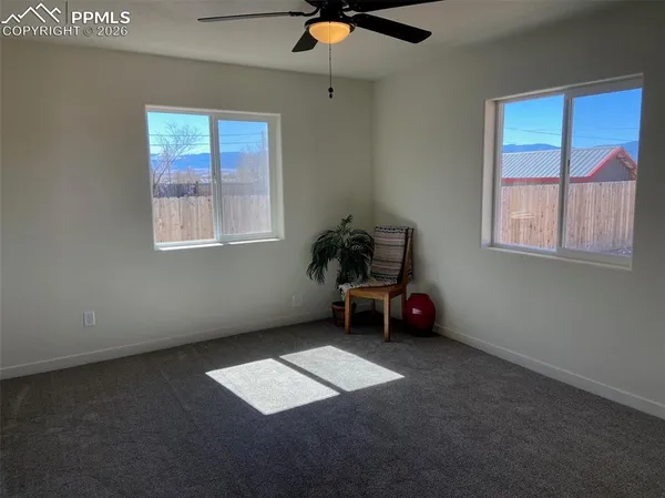an empty room with windows