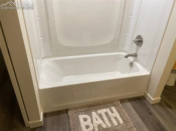a bathroom with a bathtub