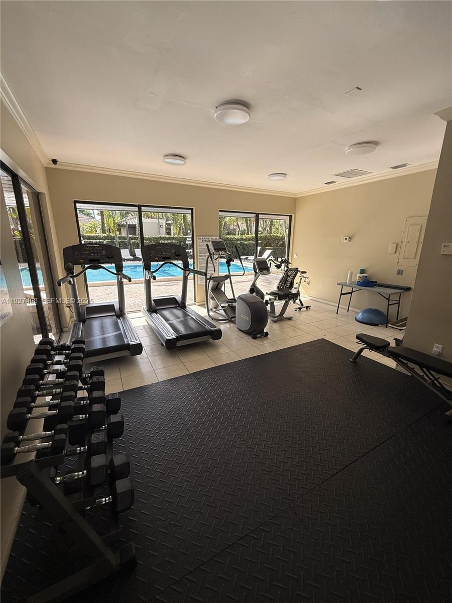 9001 Southwest 94th Street, Unit 208 Miami, FL 33176 - Photo 19 of 27 a living room with furniture and a large window