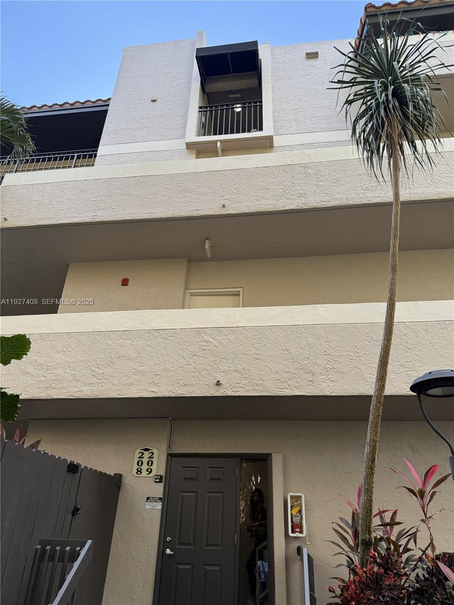 9001 Southwest 94th Street, Unit 208 Miami, FL 33176 - Photo 22 of 27 a view of entryway with a potted plant