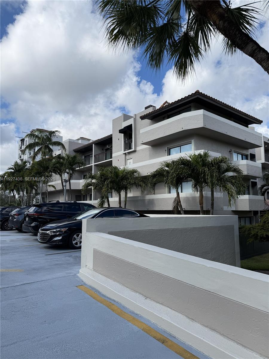 9001 Southwest 94th Street, Unit 208 Miami, FL 33176 - Photo 23 of 27 a view of multiple houses with a street
