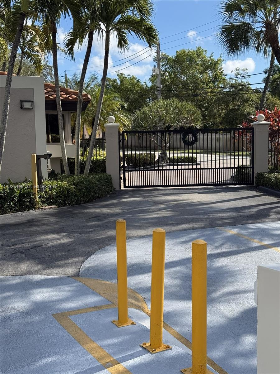 9001 Southwest 94th Street, Unit 208 Miami, FL 33176 - Photo 24 of 27 a view of a street with plants