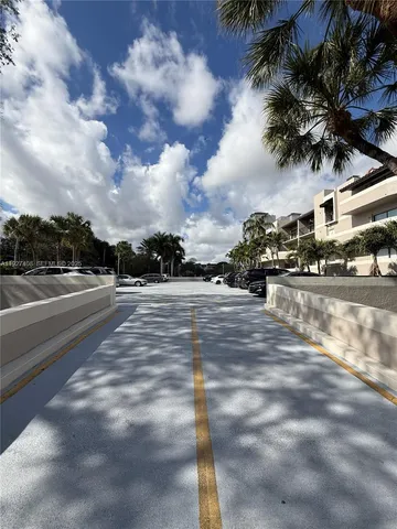 a view of an outdoor space and tennis court