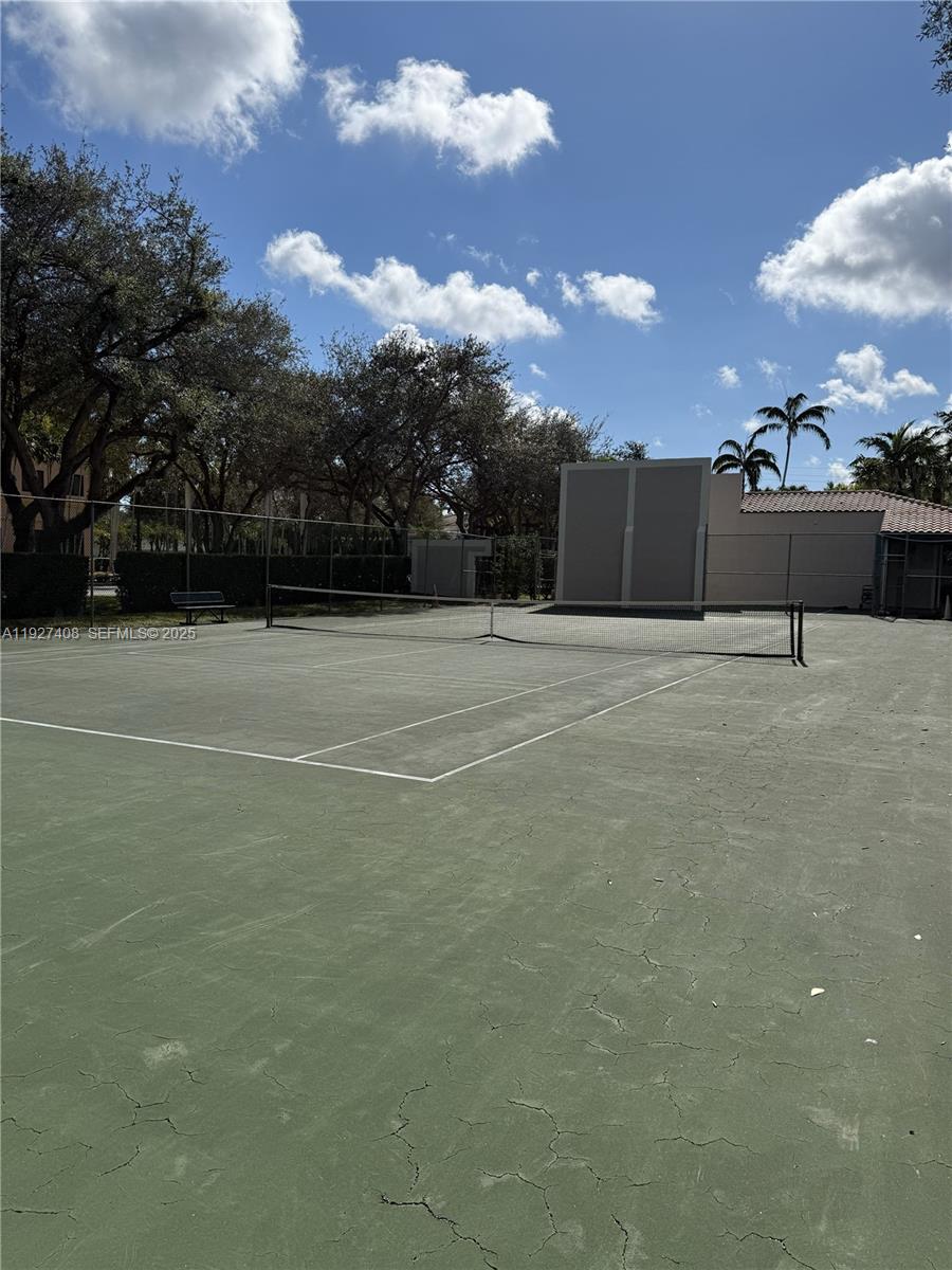 9001 Southwest 94th Street, Unit 208 Miami, FL 33176 - Photo 27 of 27 a view of an outdoor space and tennis court