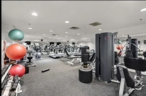 a view of a room with gym equipment
