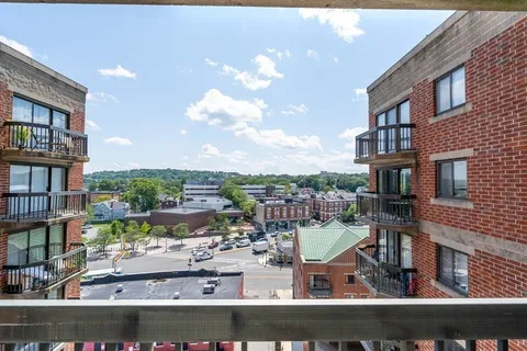 a view of a lake from a balcony