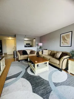 a living room with furniture and a couch