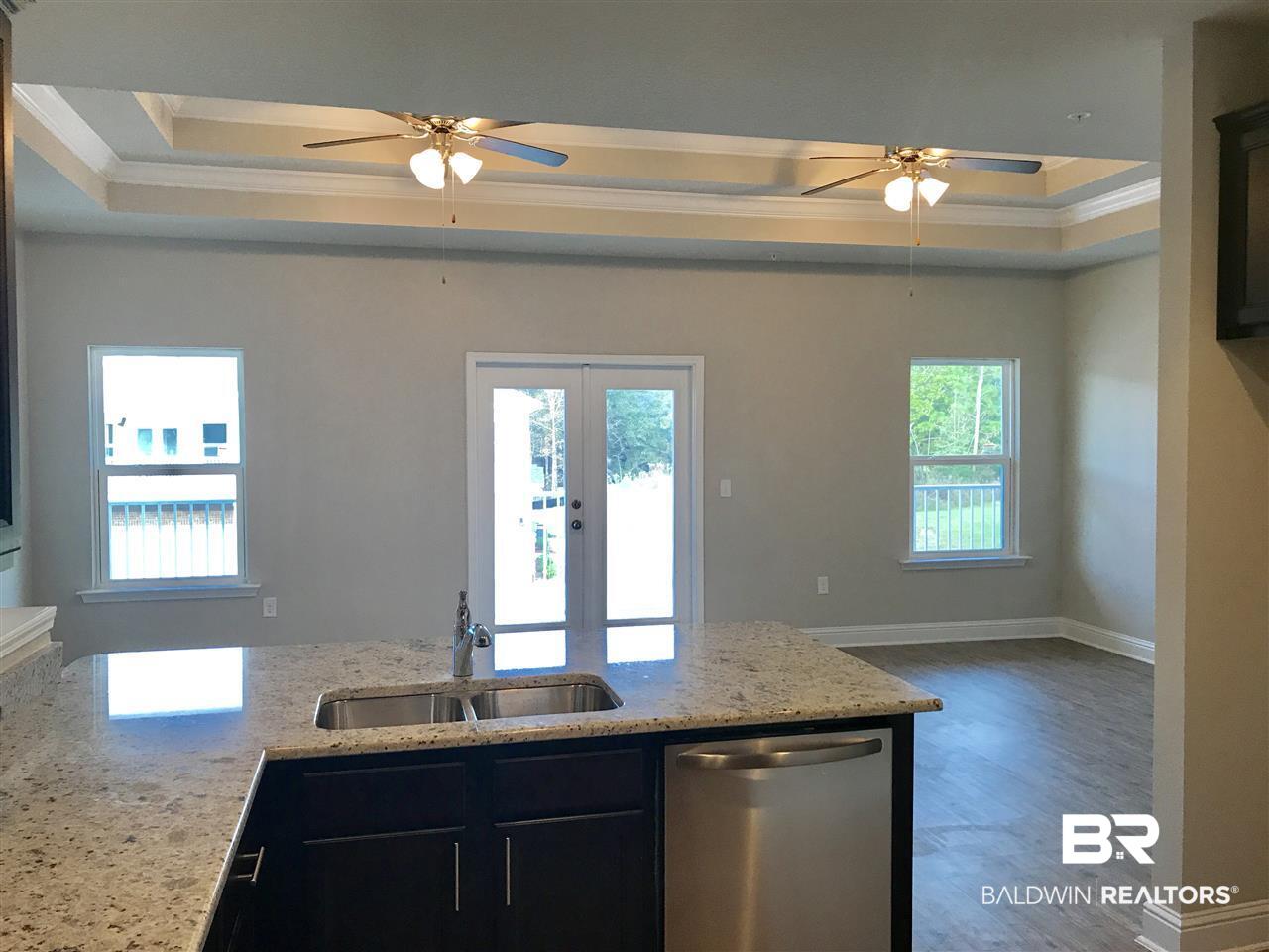 6930 Spaniel Drive, Unit 73A Daphne, AL 36527 - Photo 8 of 14 Kitchen/Living Room