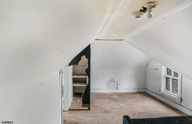 a view of an entryway with stairs