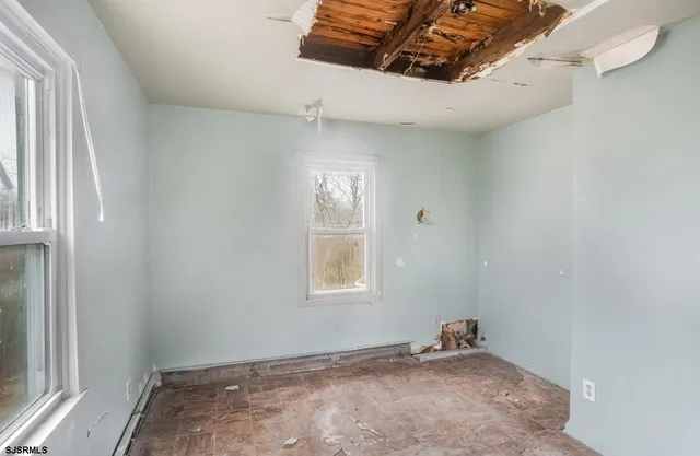 a view of a window in an empty room