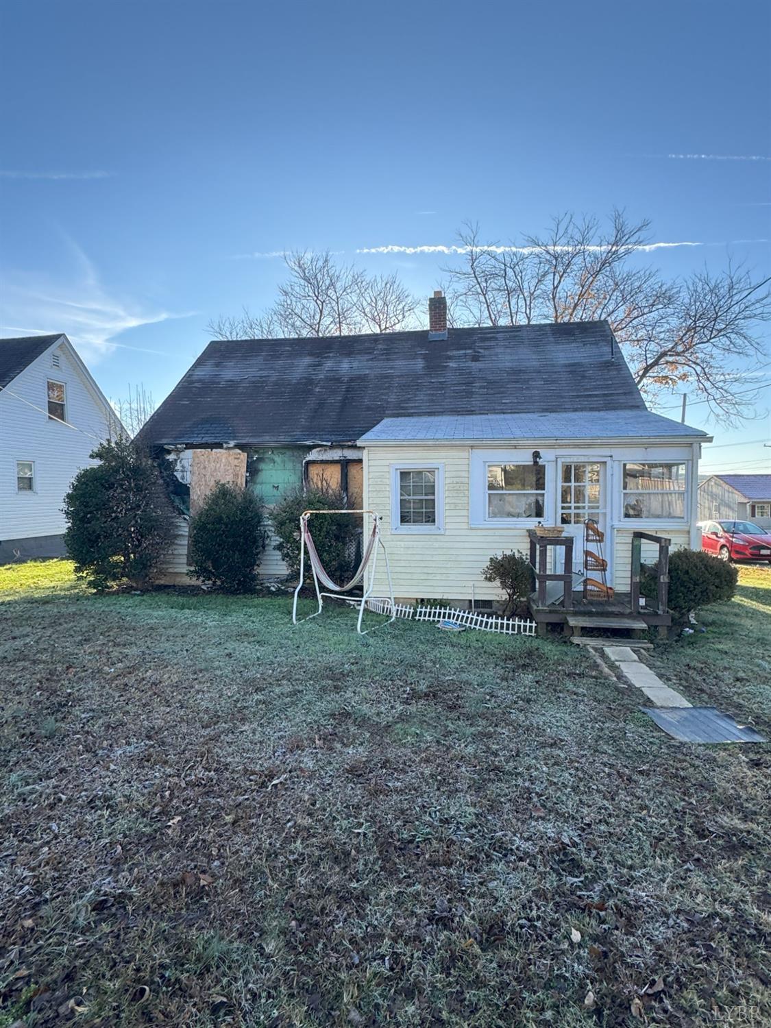 904 7th Street Altavista, VA 24517 - Photo 3 of 13 a view of a house with a backyard and a tree