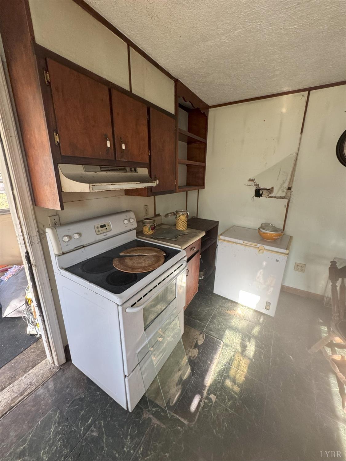 904 7th Street Altavista, VA 24517 - Photo 6 of 13 a kitchen that has a sink and a stove