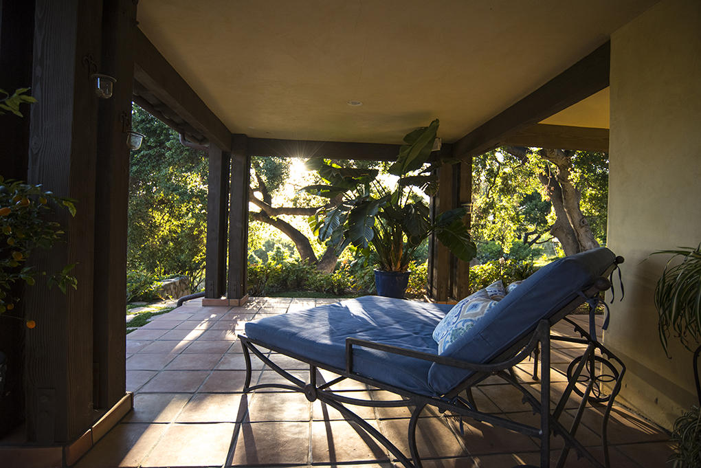 1945 Meiners Road Ojai, CA 93023 - Photo 16 of 21 a view of a patio with a table chairs and a backyard