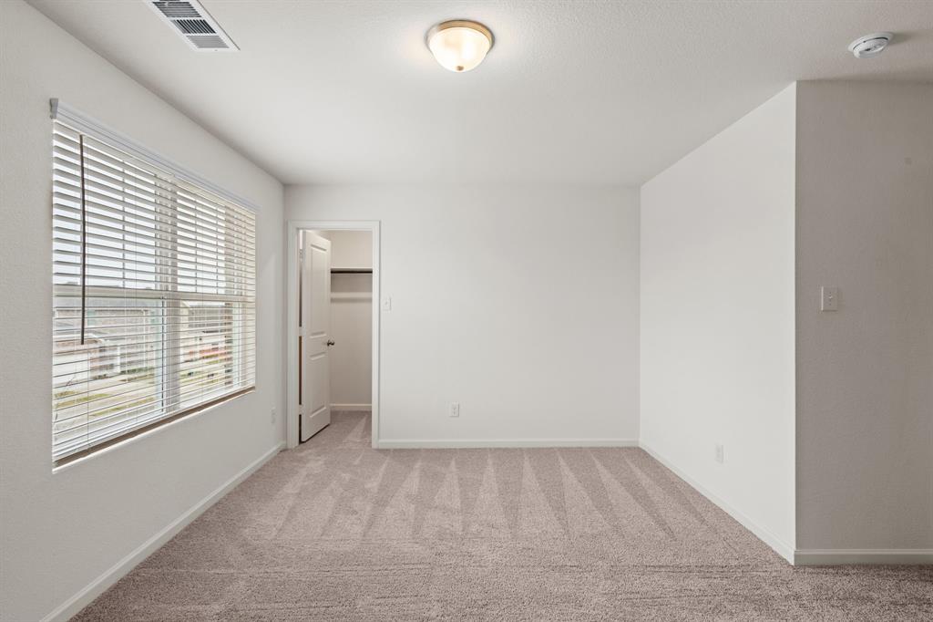 619 Colgate Circle Princeton, TX 75407 - Photo 23 of 31 a view of an empty room with a window