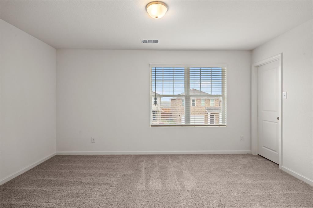 619 Colgate Circle Princeton, TX 75407 - Photo 25 of 31 a view of an empty room with a window