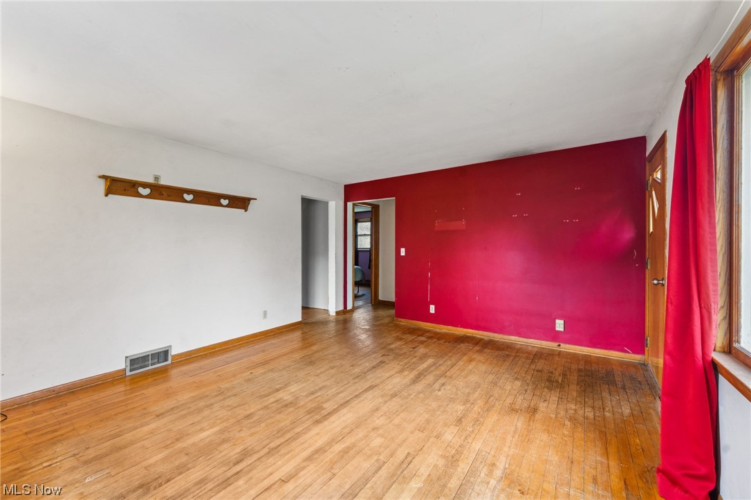 1470 Collar Price Road Hubbard, OH 44425 - Photo 12 of 23 Spare room featuring light wood-type flooring