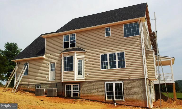 7516 Dudie Road Marshall, VA 20115 - Photo 11 of 11 a front view of a house with large windows