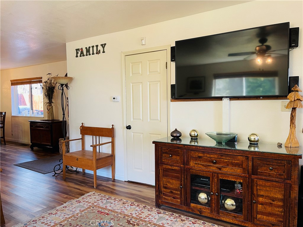 921 Piru Way Frazier Park, CA 93225 - Photo 11 of 54 a living room with furniture and a flat screen tv