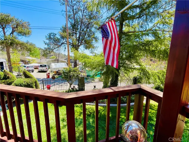 a view of a balcony with outdoor space
