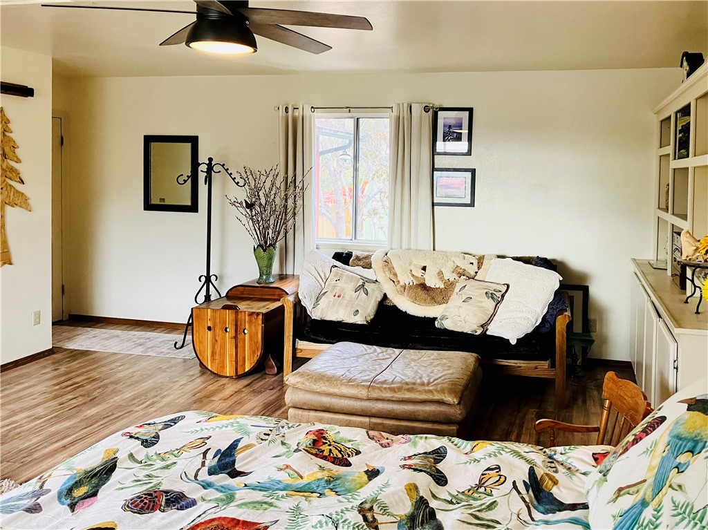 921 Piru Way Frazier Park, CA 93225 - Photo 31 of 54 a view of a dining room with furniture and wooden floor