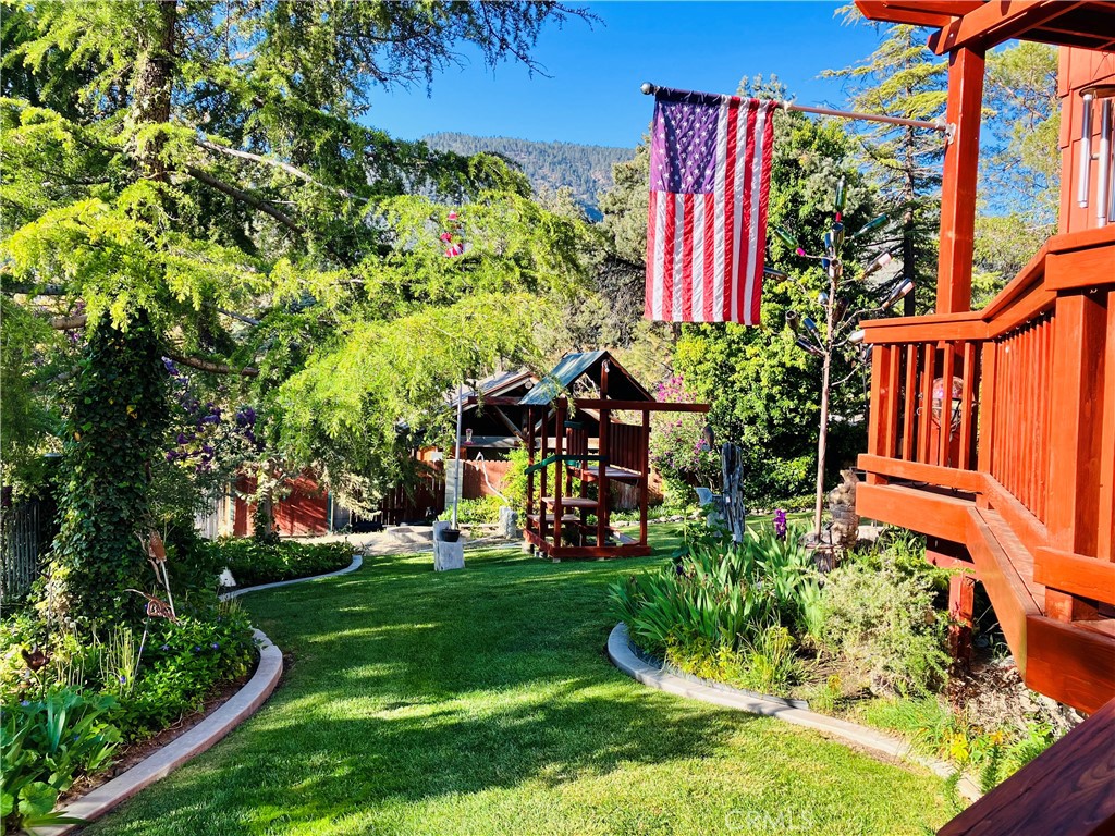 921 Piru Way Frazier Park, CA 93225 - Photo 36 of 54 a view of a house with a big yard plants and large trees