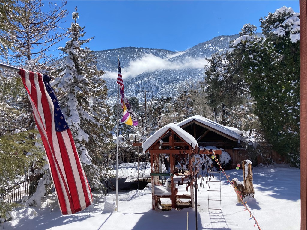 921 Piru Way Frazier Park, CA 93225 - Photo 38 of 54 a roof deck with table and chairs and potted plants