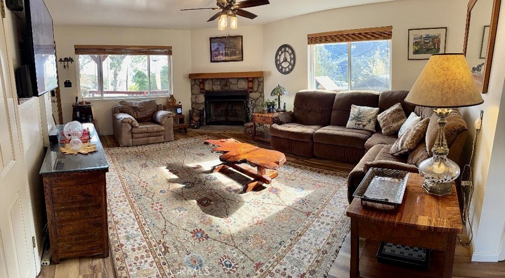 921 Piru Way Frazier Park, CA 93225 - Photo 7 of 54 a living room with furniture and a fireplace