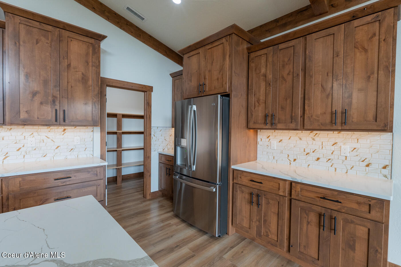 127 Backtrack Road Sandpoint, ID 83864 - Photo 10 of 30 kitchen and pantry