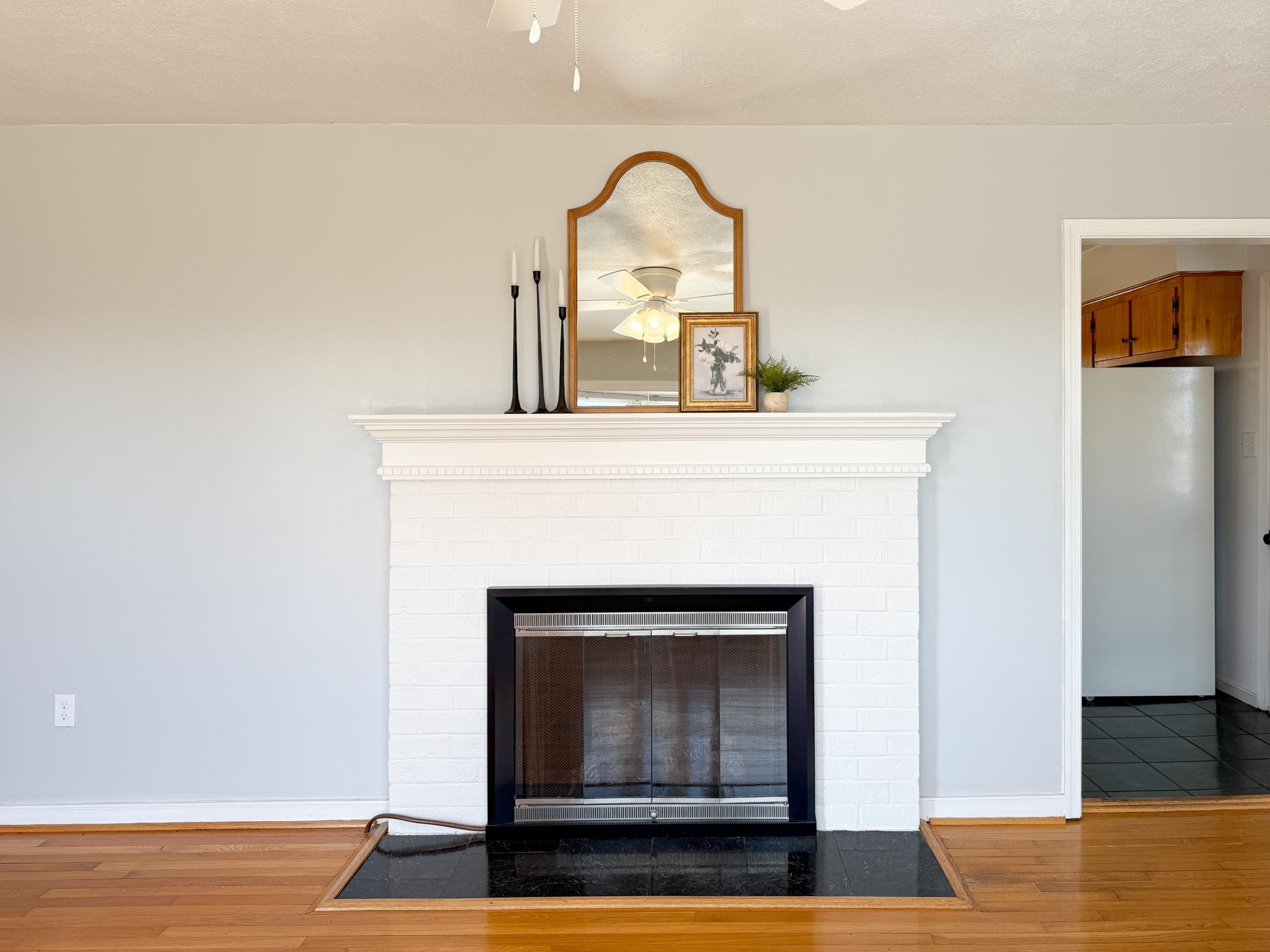 1606 Ridgeway Drive Staunton, VA 24401 - Photo 12 of 27 a living room with a fireplace and wooden floor