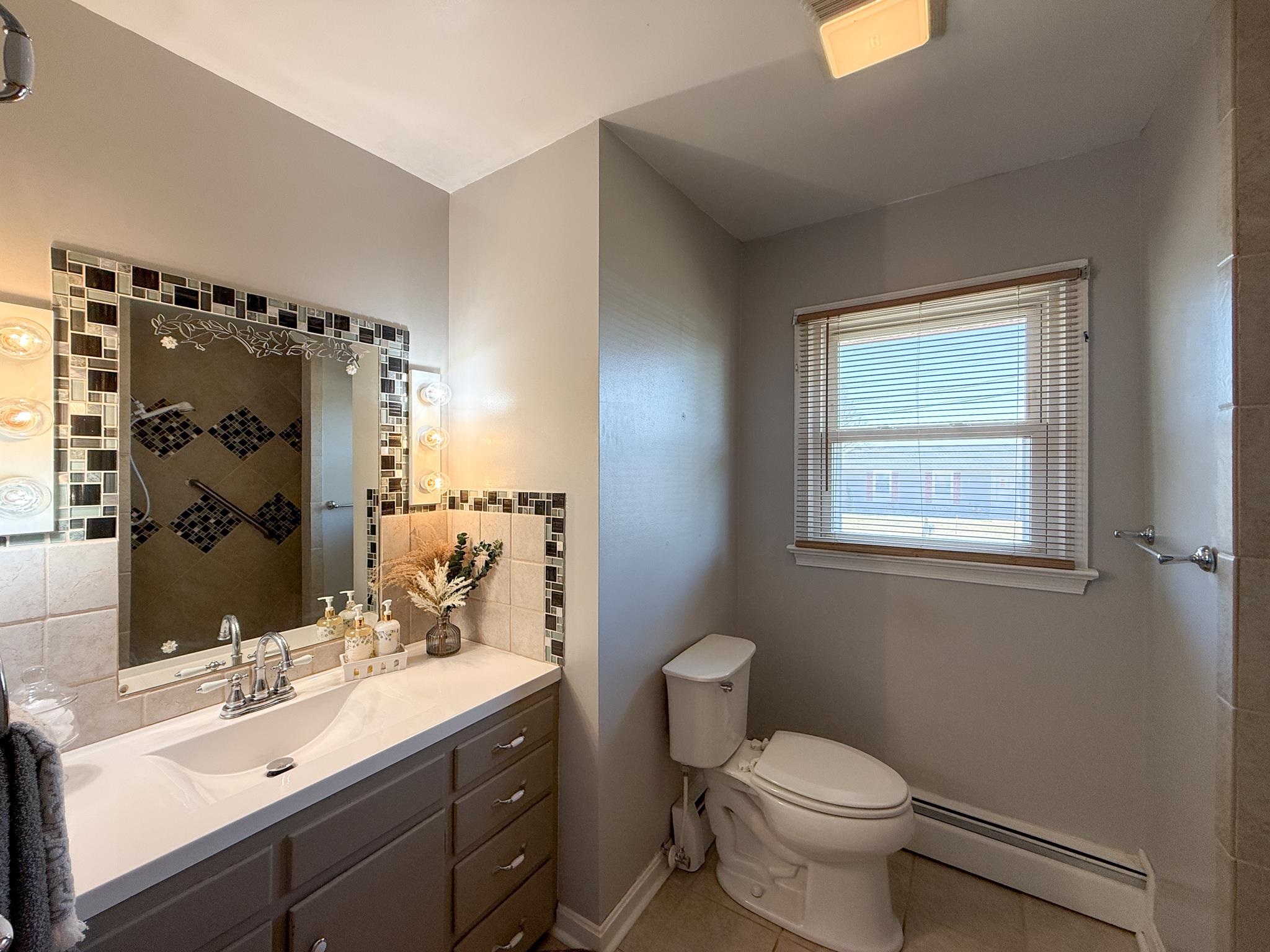 1606 Ridgeway Drive Staunton, VA 24401 - Photo 17 of 27 a bathroom with a sink toilet and shower